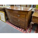 A George IV mahogany bow front chest, of two short and two long drawers incorporating a secret
