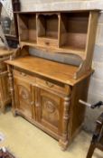 An early 20th century continental walnut buffet, width 122cm, depth 53cm, height 172cm