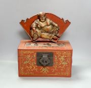 A Chinese lacquered wood Budai carving, 34cm wide, and a Chinese lacquered wood box (2)