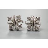 A modern pair of Tiffany & Co platinum and four stone diamond set square cluster ear studs, 7mm,