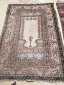 A North West Persian ivory ground prayer rug, 190 x 130cm