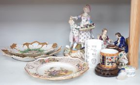 Two Meissen leaf dishes, a Dresden plate, two group figures and mixed ceramics, tallest 25cms high