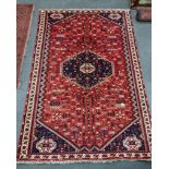 A North West Persian red ground carpet, 290 x 196cm