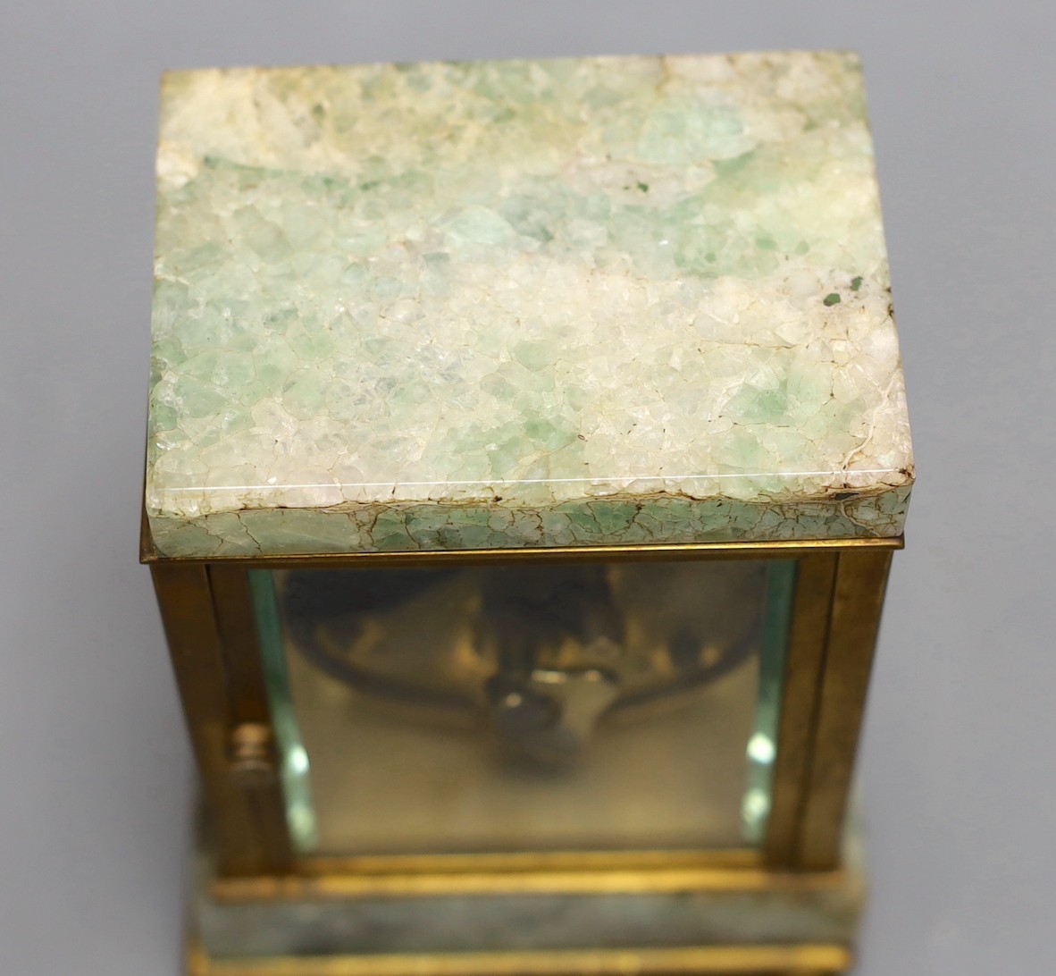 A French onyx and brass small mantel clock, with ornate enamel dial,14.5cms high - Image 4 of 4