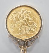 A Victoria 1883 gold sovereign, in a later 9ct gold pendant mount, on a 9k chain, gross weight 15.