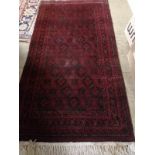A Belouch geometric rug, 180 x 96cm