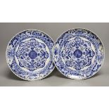 A pair of 19th century Chinese blue and white dishes, 26cms diameter