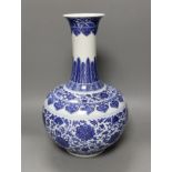 A Chinese blue and white bottle vase, Qianlong seal mark, 37cms high