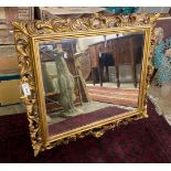 A rectangular carved giltwood Florentine style wall mirror, width 96cm, height 84cm