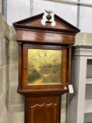 An early 19th century Irish mahogany eight day longcase clock, the square brass dial marked