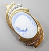 A modern two colour yellow metal and Wedgwood style cameo set oval pendant clip brooch, carved