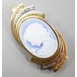 A modern two colour yellow metal and Wedgwood style cameo set oval pendant clip brooch, carved