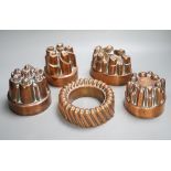 Five Victorian Benham & Froud copper jelly moulds, tallest 12cms