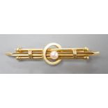 An early 20th century 15ct and cultured pearl set bar brooch, 46mm, gross weight 3.3 grams,