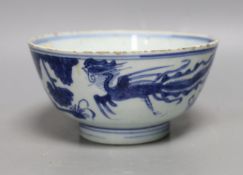 A Chinese blue and white ‘phoenix’ deep bowl, 17th century, 15.5cm Provenance- collected by the