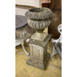 A circular reconstituted stone campana garden urn on square pedestal, height 95cm