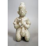 A Thai celadon Buddhist figure, Si Satchanalai, c.1450-1599, 18cms high Provenance- collected by the