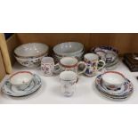 A large selection of 18th century Chinese export porcelain bowls, plates and mugs a/f