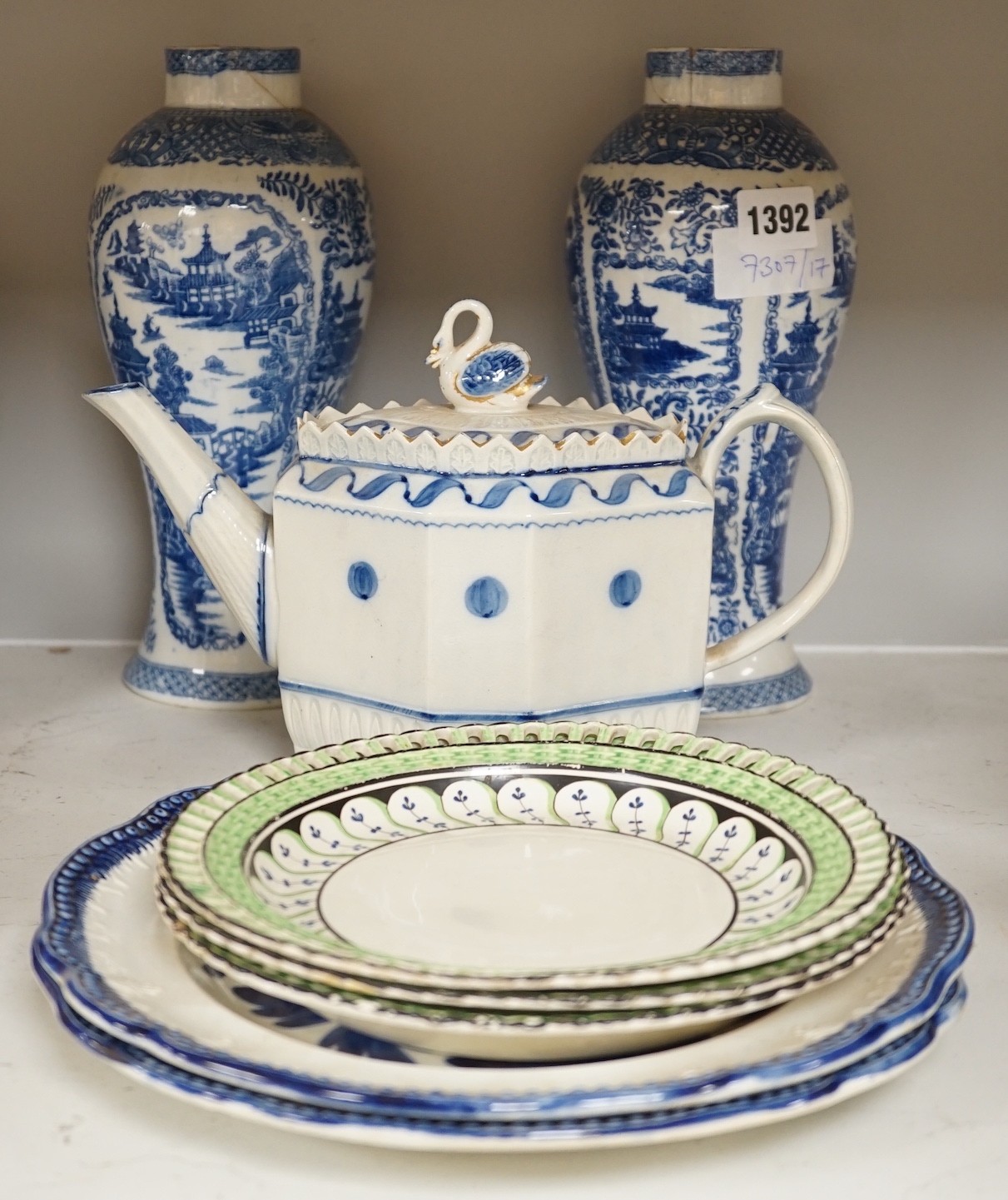 A pair of 19th century blue and white chinoiserie vases, a pearlware teapot, possibly Harley of Lane