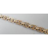 A modern 9ct gold interwoven circular link bracelet, 17.5cm, 8.3 grams.