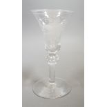 An 18th century Newcastle type baluster wine glass, 18cms high