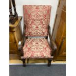 An early 20th century French carved walnut open armchair, width 62cm, depth 76cm, height 108cm