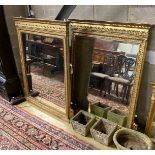 A pair of 19th century giltwood and composition overmantel mirrors, width 114cm, height 120cm