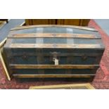 An early 20th century dome top travelling trunk, width 92cm, height 56cm