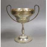An Edwardian demi fluted silver two handled trophy cup, by Mappin & Webb, Sheffield, 1901, with