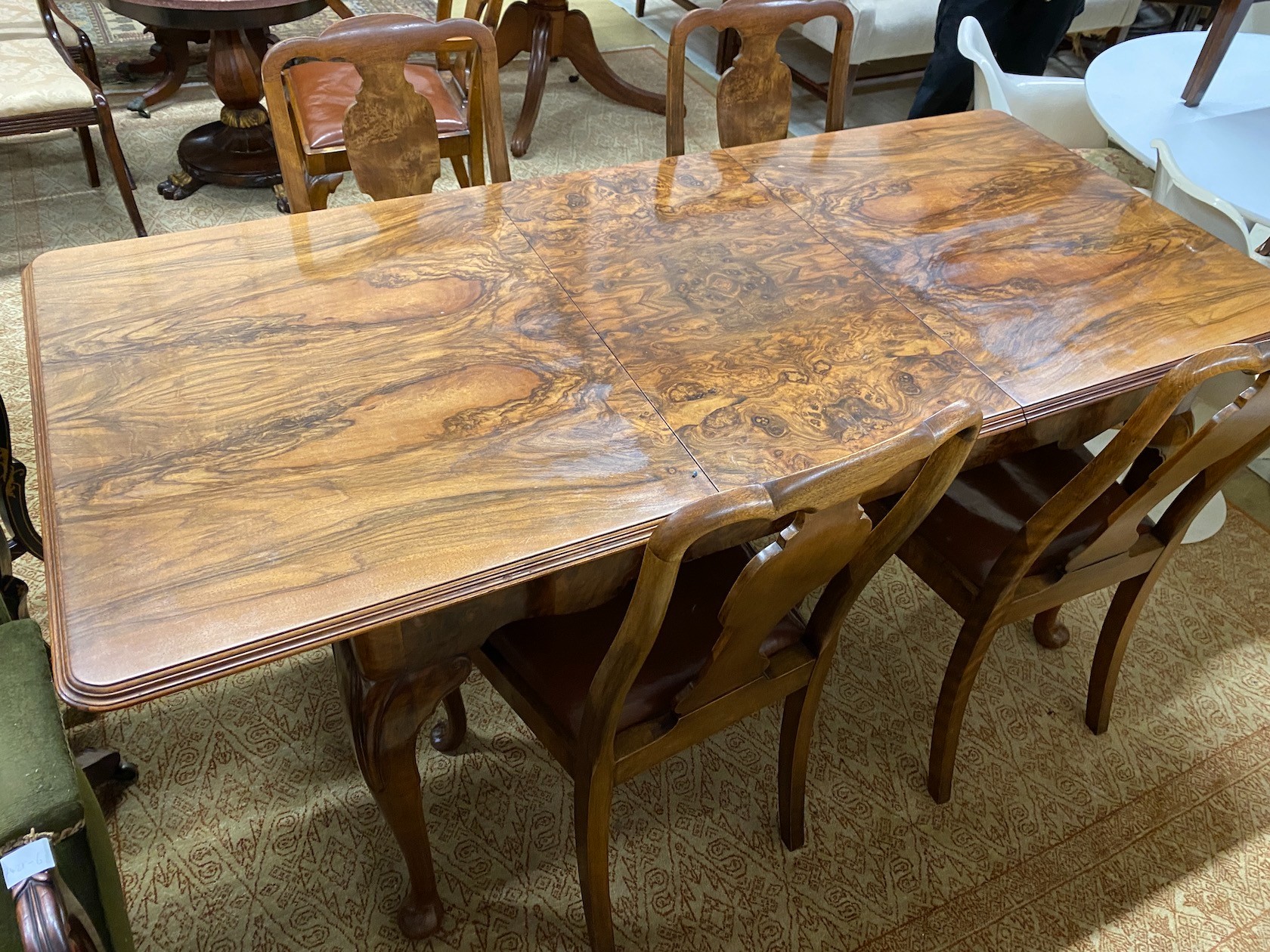 A Queen Anne revival figured walnut extending dining table, length 183cm extended, one spare leaf, - Image 2 of 3