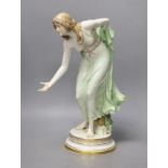 A Meissen Art Nouveau figurine of a young lady playing boules, early 20th century, modelled by