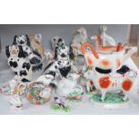 A quantity of Victorian Staffordshire animal figures, two pearlware putti and a Derby figure of a