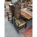 A set of ten early 20th century Jacobean Revival caned beech and walnut high back dining chairs, two