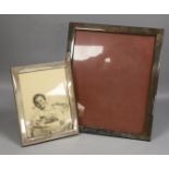 A large German 835 standard white metal mounted rectangular photograph frame, 34cm and a smaller