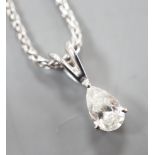 A modern white metal and pear cut diamond set pendant, 13mm, on an 18ct white gold chain, 39cm,