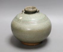 A Thai Sawankhalok green glazed ring handled jar, 15th century Provenance- collected by the vendor’s