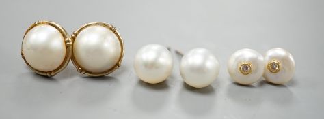 A pair of 18ct and cultured pear ear studs, a pair 9ct gold and mabe pearl ear studs and a pair of