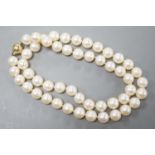 A single strand cultured pearl necklace, with magnetic ball clasp, 44cm.