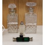 Two silver collared cut glass decanters, tallest 24.5 cm high