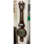 An early 19th century mahogany wheel barometer, height 98cm