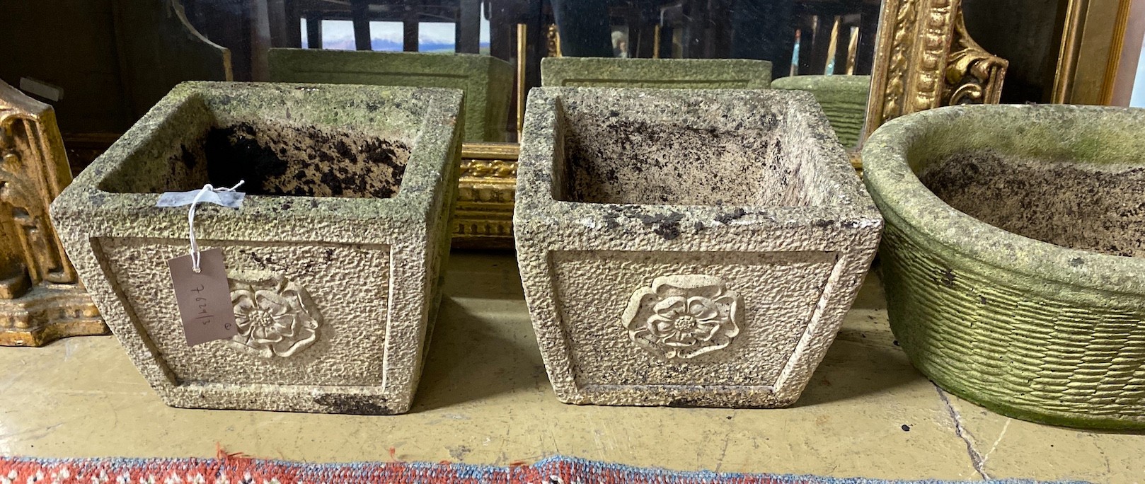 A pair of square reconstituted stone garden planters, height 19cm and a larger oval planter - Image 2 of 3