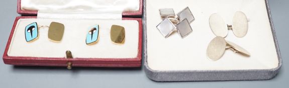 A cased pair of Garrard & Co 9ct gold and enamelled cufflinks, length 16mm, gross weight 7.8