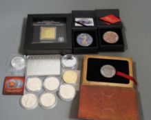 Ten bullion silver 1oz. commemorative coins, a bullion silver 2oz. coin and a Canada 2oz. silver
