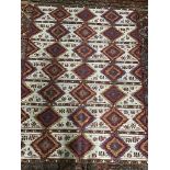 A modern Kilim style polychrome rug, 220cms x 150cms