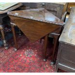 A 19th century triangular folding mahogany pad foot occasional table, width 79cm, depth 43cm, height