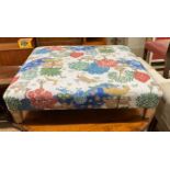 A contemporary rectangular large footstool upholstered in Sanderson animal fabric, length 103cm,