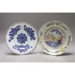 An early 18th century Delft polychrome dish and a mid 18th century Delft blue and white plate,