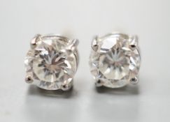 A pair of 18ct gold and solitaire diamond set ear studs, stone diameter approx. 4.8mm, gross