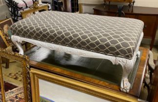 A George III style rectangular painted upholstered footstool, length 130cm, depth 65cm, height 46cm