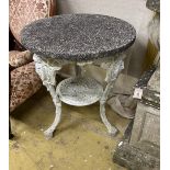 A Victorian cast iron circular garden table with weathered stone top, diameter 61cm, height 72cm